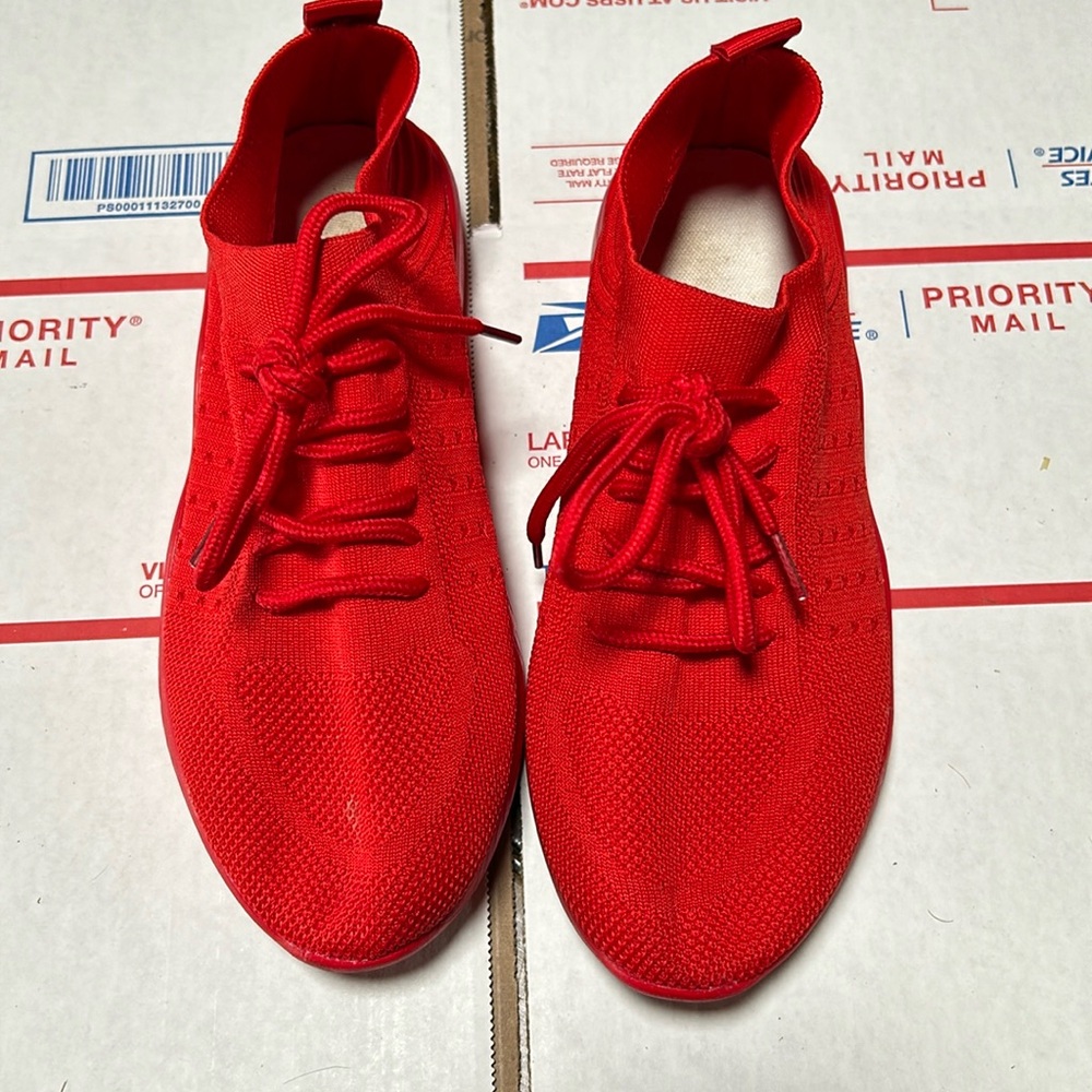 Size 39 slip on sneakers. Red